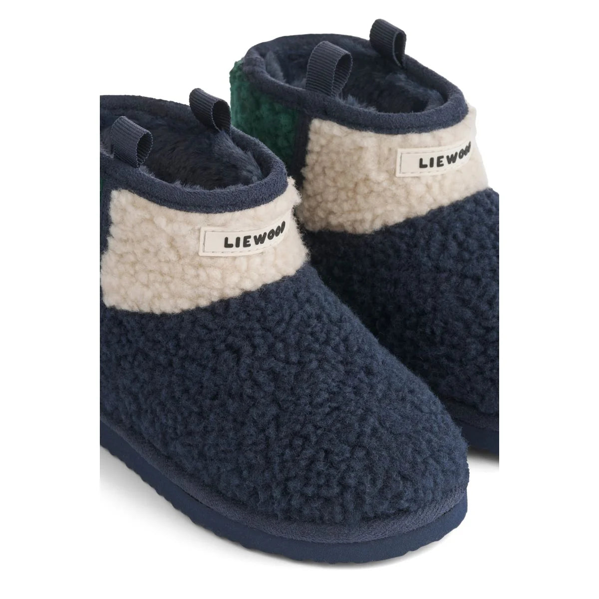 Albi pile boot classic navy multi mix navyblaue und cremefarbene shearling slip-on boots mit grünem innenfutter