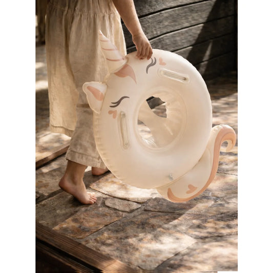 Baby-schwimmring sweet unicorn aus weichem, transluzentem material mit rosa akzenten ideal für ökologische