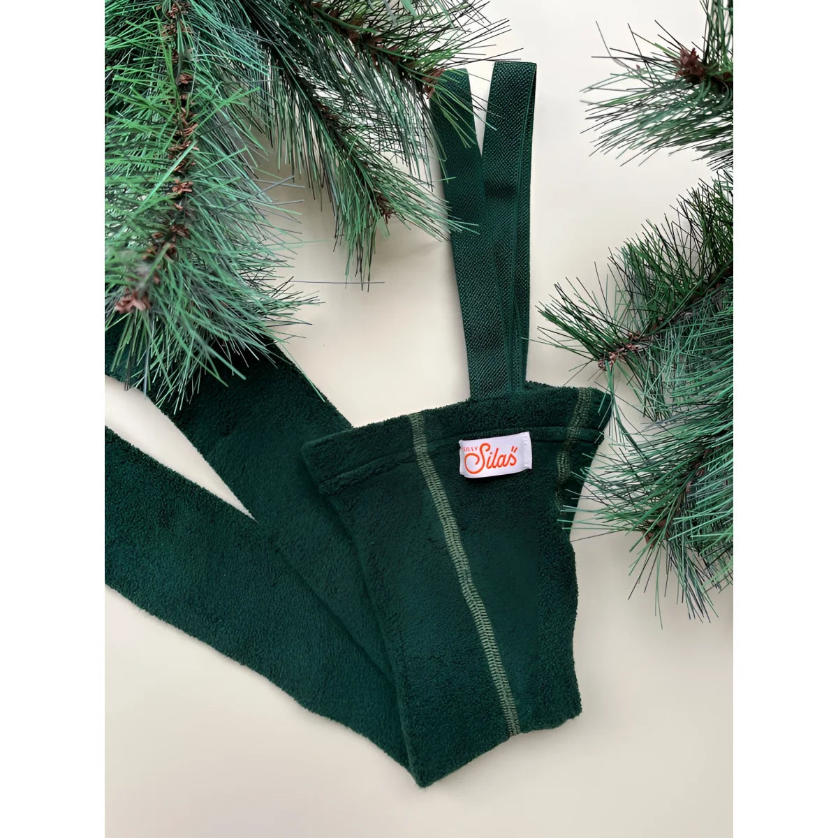 Dunkelgrüne Latzhose mit Markenlabel aus der Teddy Warmy Kollektion