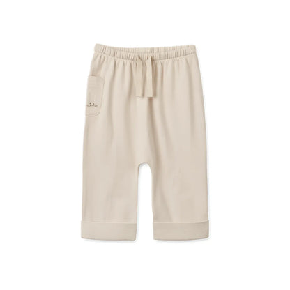 Beige Jogginghose mit Kordelzug und hochgekrempelten Säumen von Babyhose Alain | Sandy