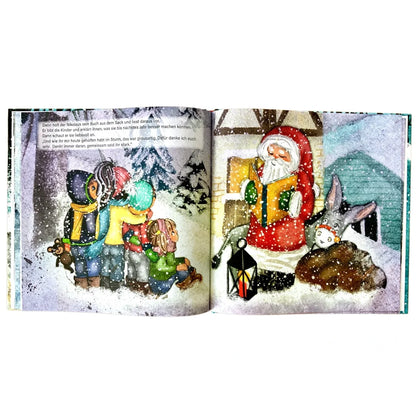 Offenes Bilderbuch mit bunten Winterillustrationen von Nikolaus und spielenden Kindern