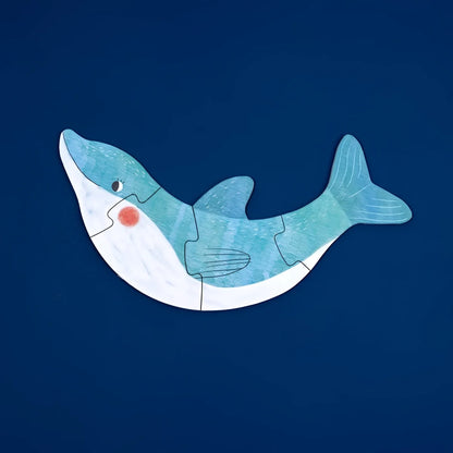 Charmantes Delfin-Puzzle in Türkis und Weiß mit rotem Kreisnasen aus Pappe