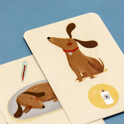 Bobby & Misha Tiny Game: Sahnekarte mit braunem Dackel und Hasengarten-Puzzle