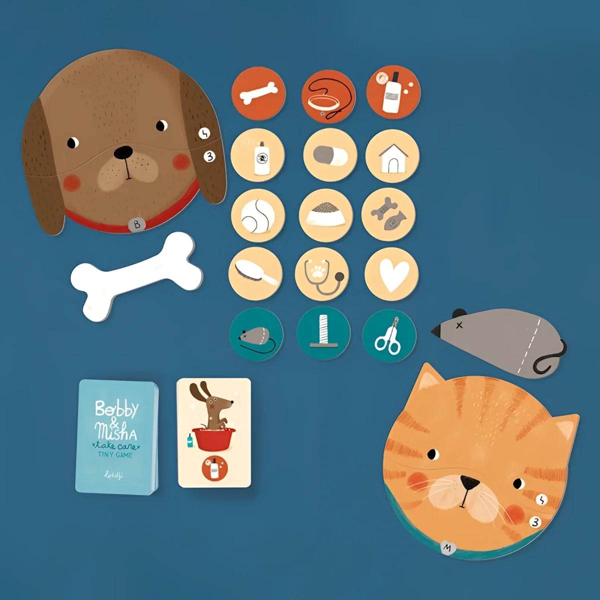 Brauner Papp-Hundekopf mit rotem Halsband und nummerierten Flecken im Bobby & Misha Tiny Game