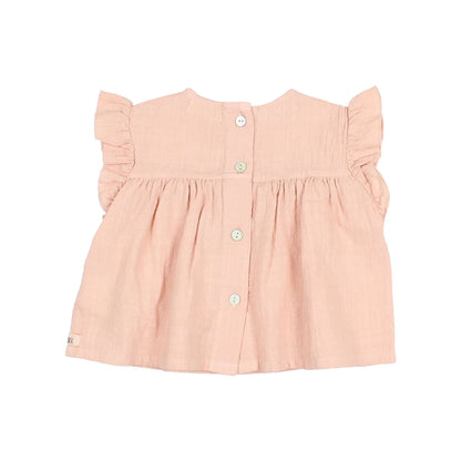 Rosa Rüschenbluse mit Knopfverschluß und Raffung im Boho-Stil