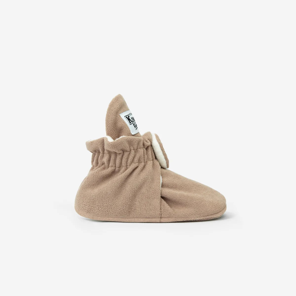 Beige Babybooties aus weichem Stoff mit elastischem, gerafftem Knöchel