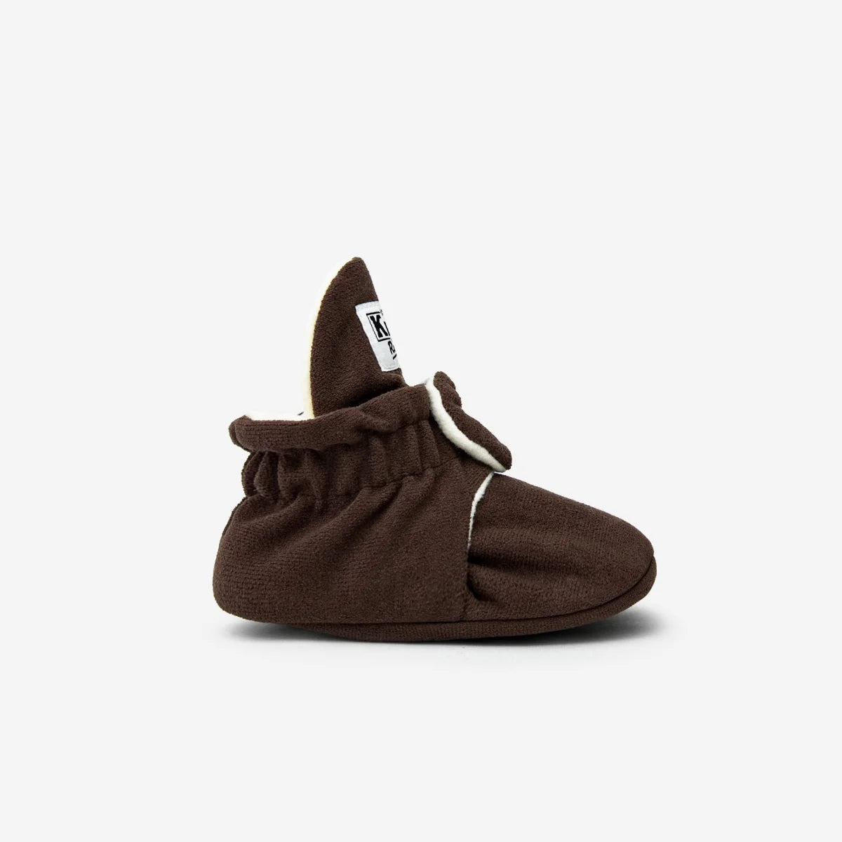 Braune Stoffbabybooties mit weißem Rand und elastischem Bündchen für 12-24 Monate