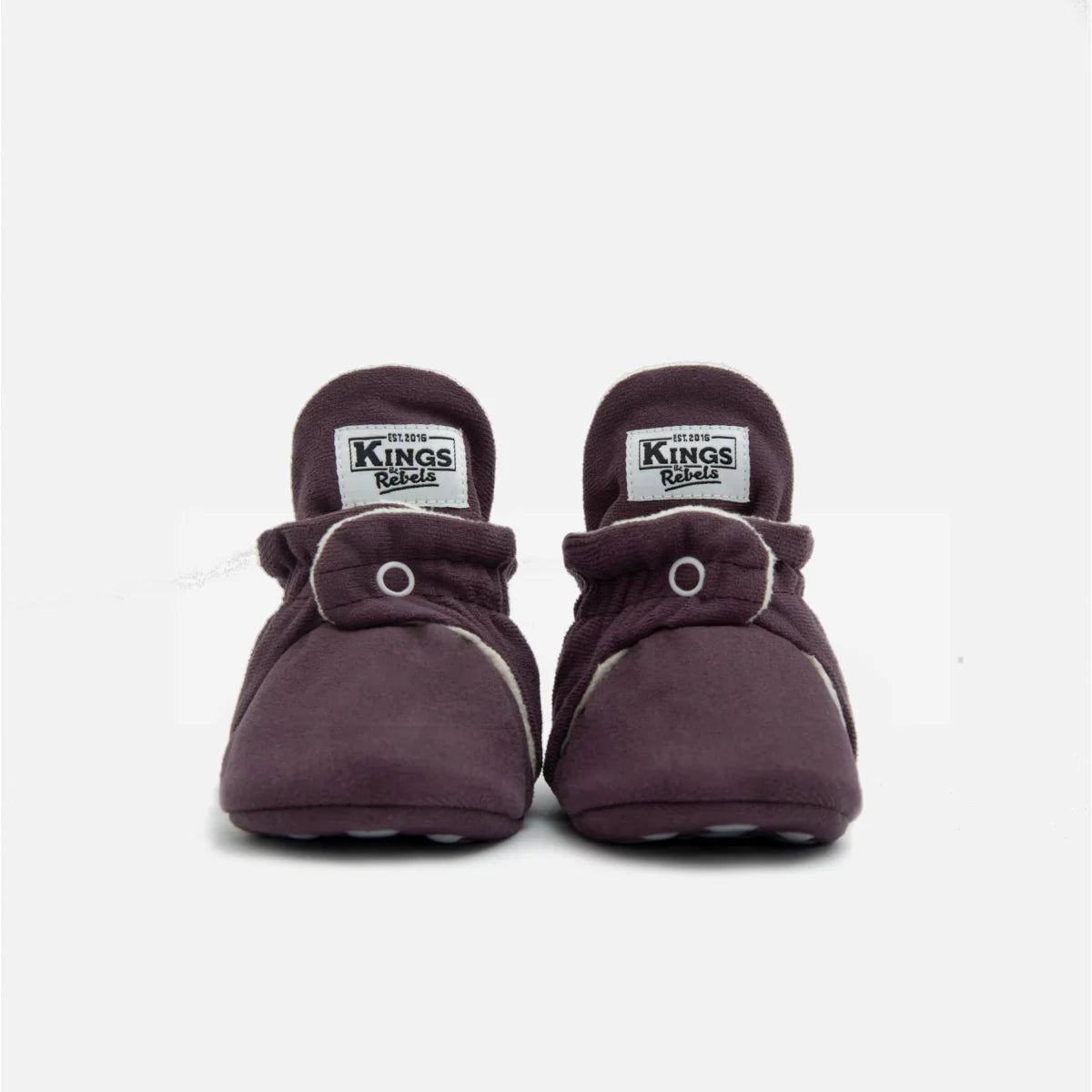 Dunkelviolette Babybooties mit weißem Rand und Druckknöpfen für 12-24 Monate