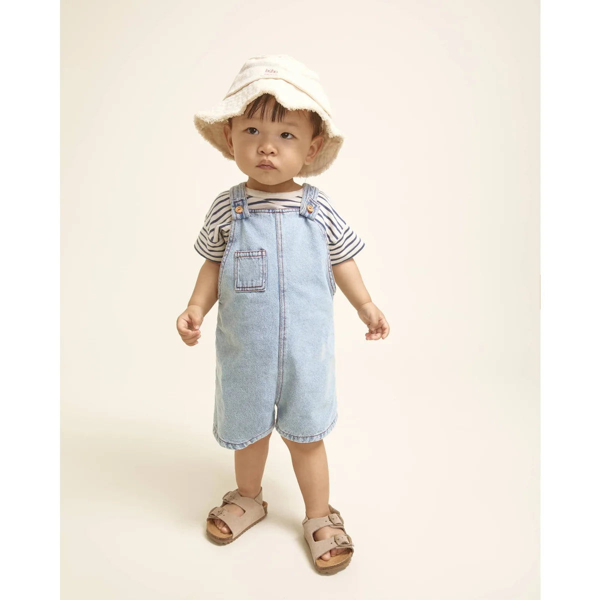 Helleblaue Denim Dungaree Latzhose mit Vordertasche und verstellbaren Trägern