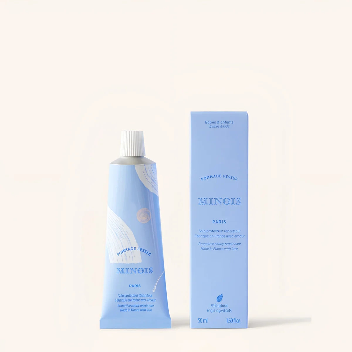 Light blue tube of Minois Paris protective repair diaper cream 50 ml with matching light blue rectangular box for babies