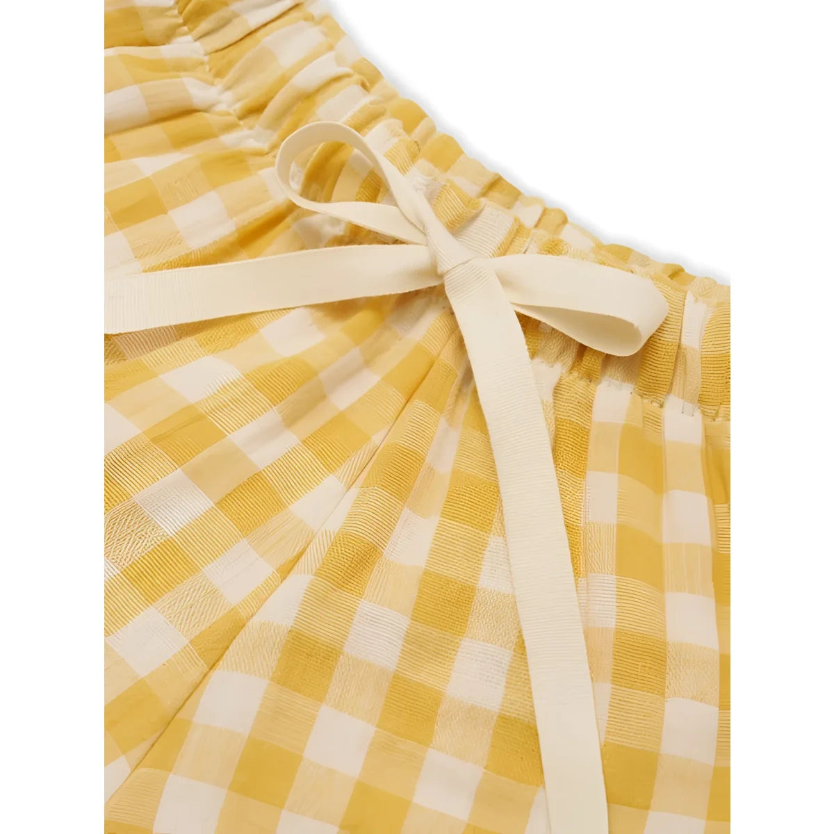 Frill Shorts Honeycomb Gingham: gelber-weißer Karo-Stoff mit Sahneband-Schleife am Bund
