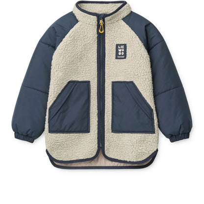 Cremefarbene Sherpa-gefütterte Jacket Runa Mist Classic Navy mit marineblauen Ärmeln und Fronttaschen
