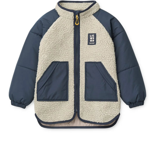 Cremefarbene Sherpa-gefütterte Jacket Runa Mist Classic Navy mit marineblauen Ärmeln und Fronttaschen