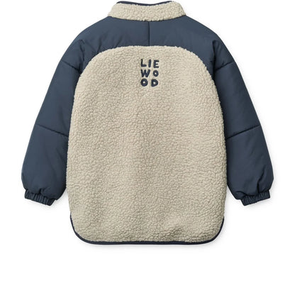 Beige und marineblaue sherpa gefütterte pufferjacke runa mit lie wood logo auf der rückseite