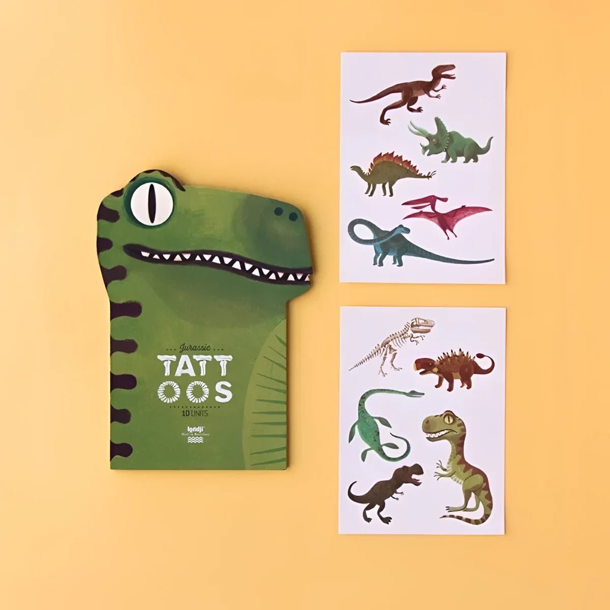 Dinosaur-geformte temporäre Tattoos im Paket mit bunten Designs von Jurasic Tattoos