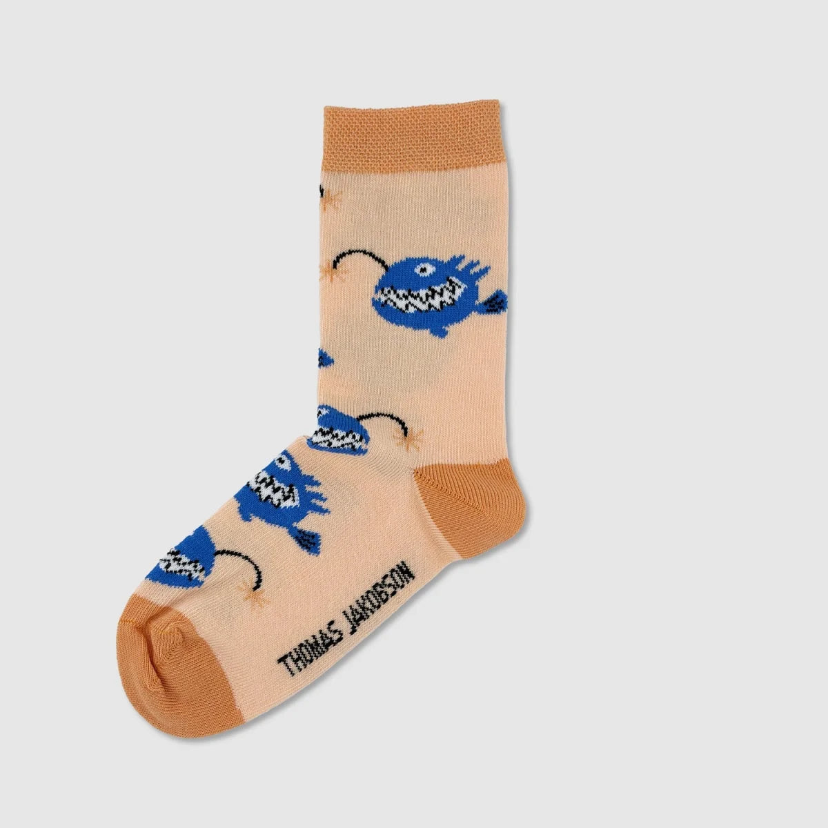 Kindersocken ANGLERFISCH von Thomas Jakobson, linke Socke mit Tiefsee-Motiv