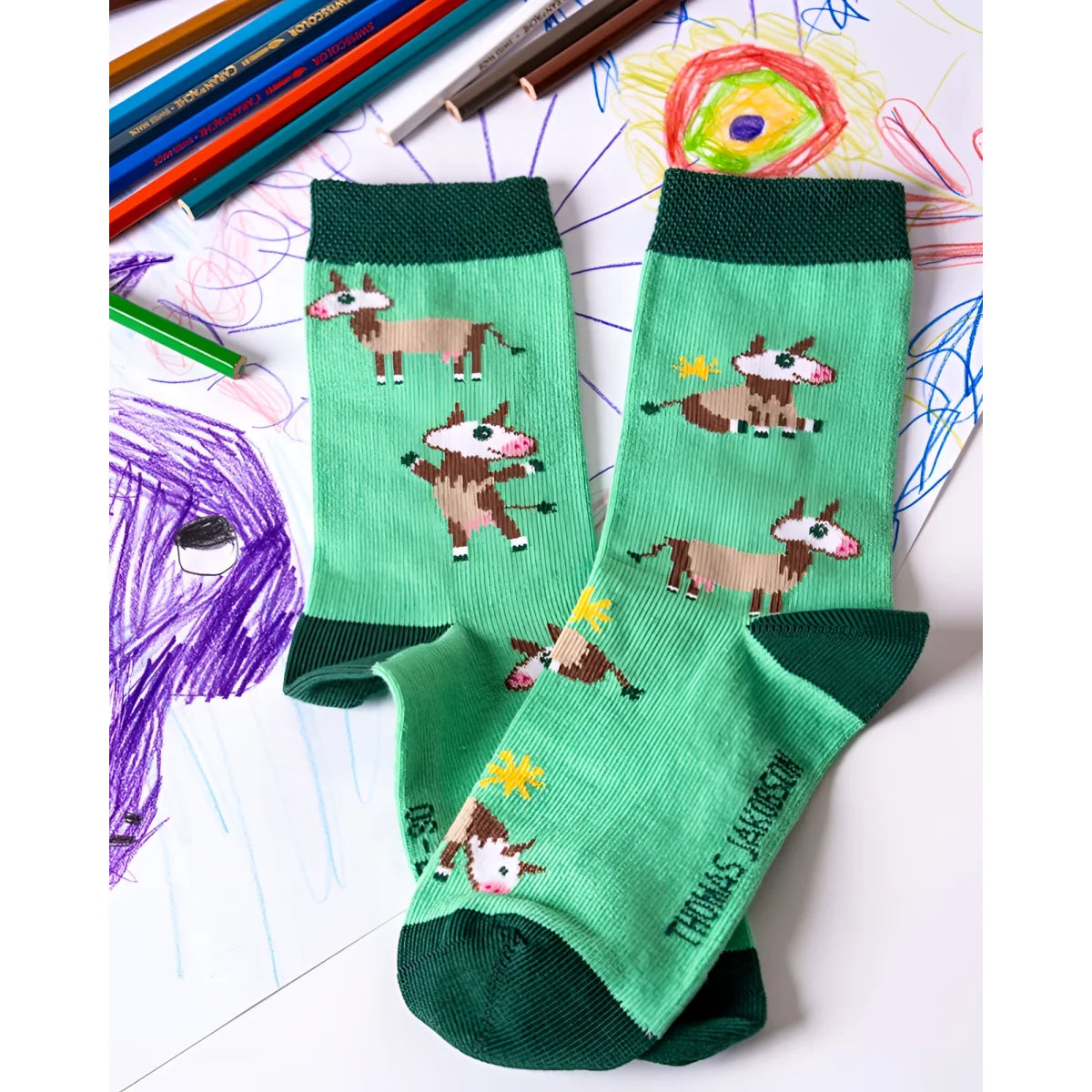 Kindersocken KÜHE von Thomas Jakobson im Flatlay