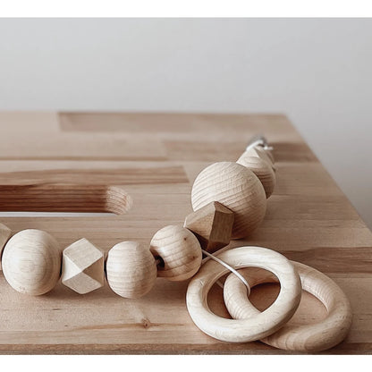 Natürliche Kinderwagenkette Daisy Daylight mit Holzperlen und Ringen