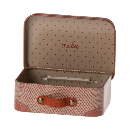 Rosa und weiße gepunktete Reisetasche mit Ledergriff und gepunktetem Innenfutter
