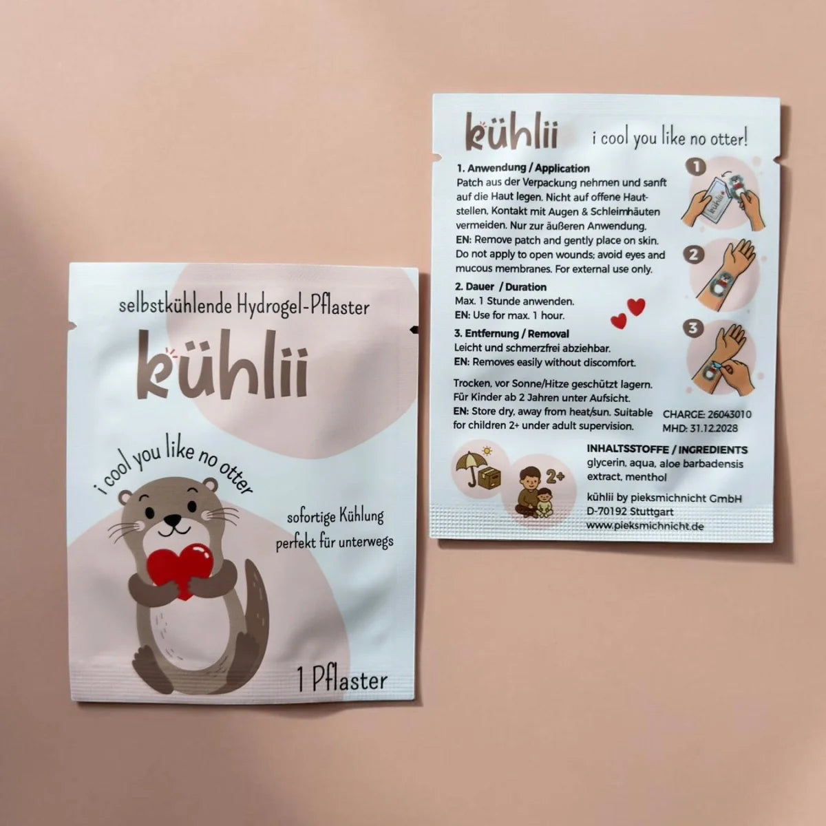 KühlII selbstkühlendes hydrogelpflaster mit otter-motiv in softem rosa und weißer folienverpackung