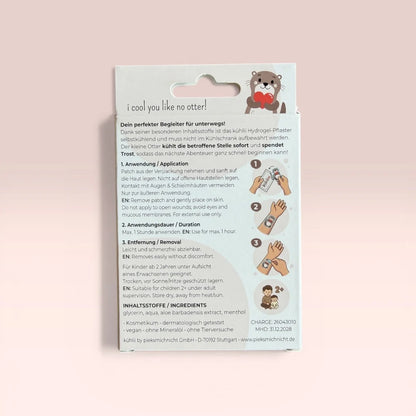 Pale blue and white kühlii self-cooling hydrogel patch package with an otter holding a red heart and bilingual instructions