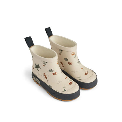 Helle Regenstiefel mit Tiermotiven und schwarzen Gummisohlen von Sea creature Sandy