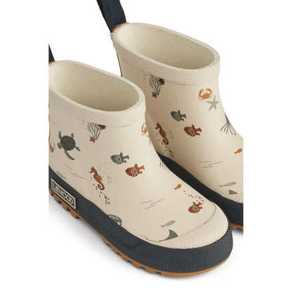 Cremefarbene Regenstiefel mit Meereslebewesen-Muster von Tekla im Produkt Sandy