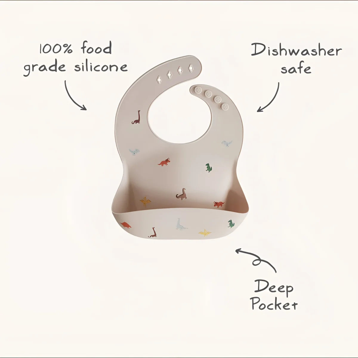 Beige silikonlätzchen mit bunten dinosauriermotiven und tiefer tasche für nachhaltige babykleidung schweiz