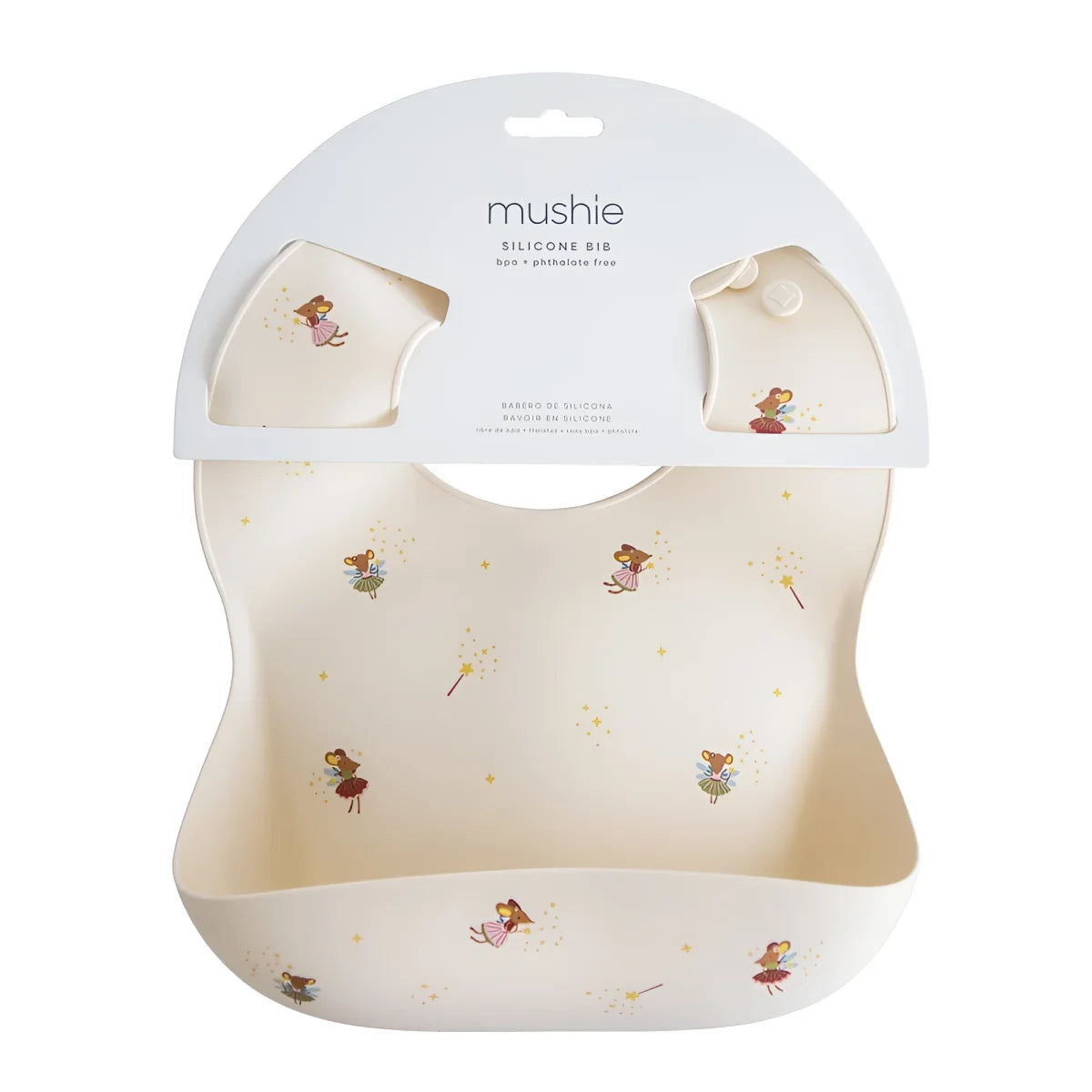 Creamfarbiges silikonlätzchen mit märchenmäusenmuster von mushie verpackt als ökologische baby- & kinderprodukte