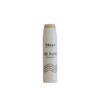 Lip Balm Pink Grapefruit mit Mère-Logo und wellenförmigem Textdesign