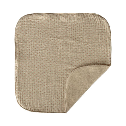 Beige muslin burp cloth with subtle dot pattern from lullaby friends hase mini nature for ökologische baby- & kinderprodukte