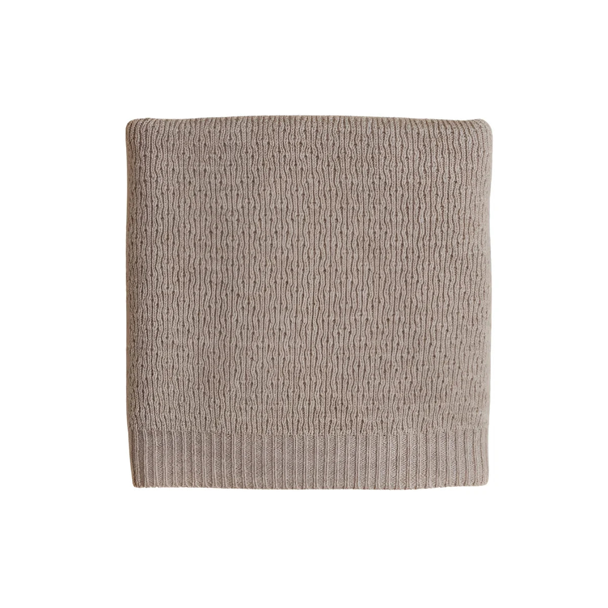 Beige gestrickte quadratische Textilie mit geripptem Rand der Merino Strickdecke Dora