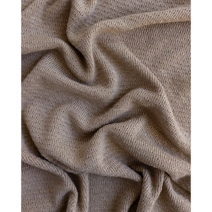 Weiches, gewelltes beiges Stoff mit gestrickter Textur der Merino Strickdecke Dora in Sand