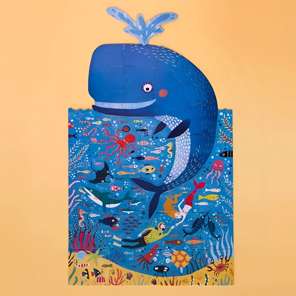 Blauer Cartoonwal mit Wasserspur Wassertropfen für My Big Blue Puzzle