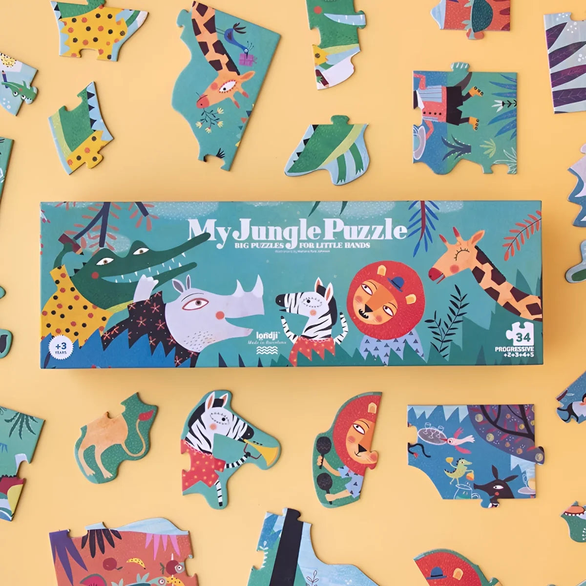 Mein Dschungel-Puzzle: Bunte cartoon-Tiere auf türkis-blauer Oberfläche