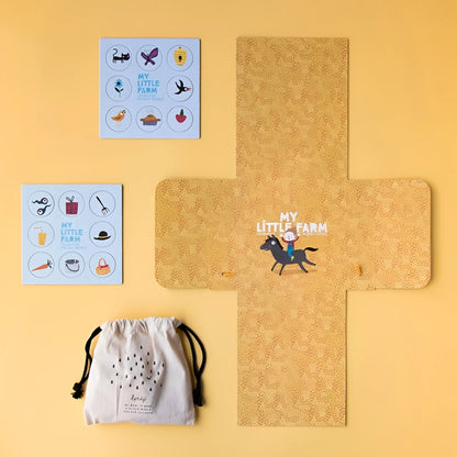 Beige Korktafel mit Cartoon-Kind auf Pferd und Text My Little Farm für Pocket Puzzle