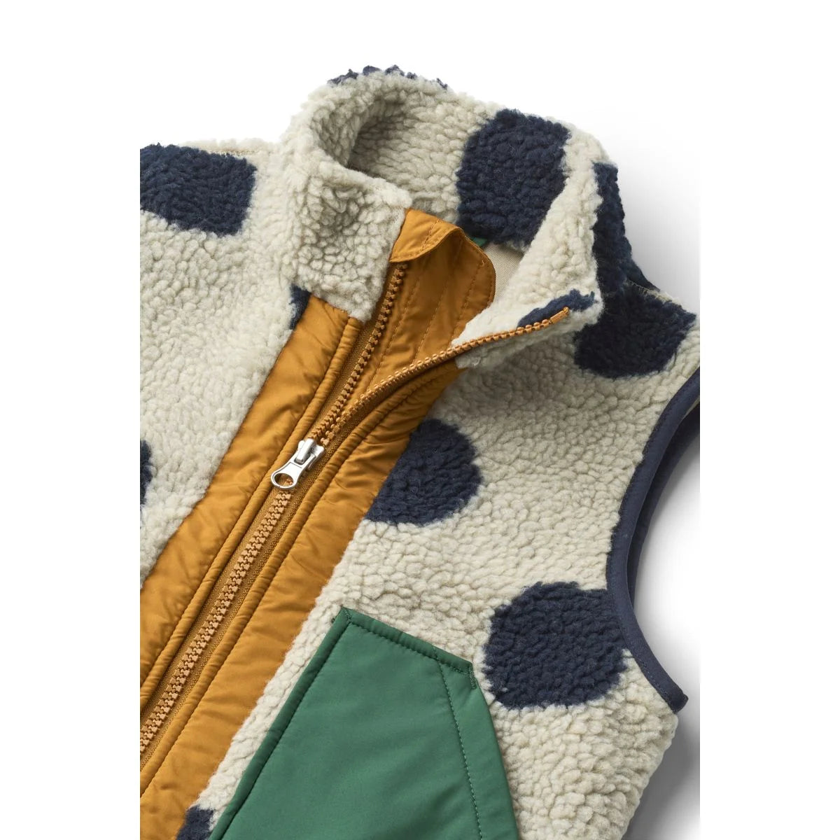 Noam pile vest in creme mit marineblauen punkten und senfgelbem reißverschluss aus fleece