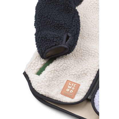 Creamfarbene sherpa-gefütterte nolan fleecejacke mit marineblauen fleecÄrmeln und braunem lie wood lederpatch