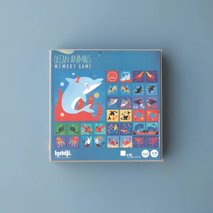 Blaue Kartonbox für Londji Ozean-Tiere Gedächtnisspiel mit Delfin-Motiv