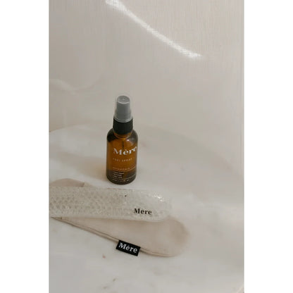 Amber-Glas-Sprayflasche und Stoffschuhe für das Produkt Peri Spray
