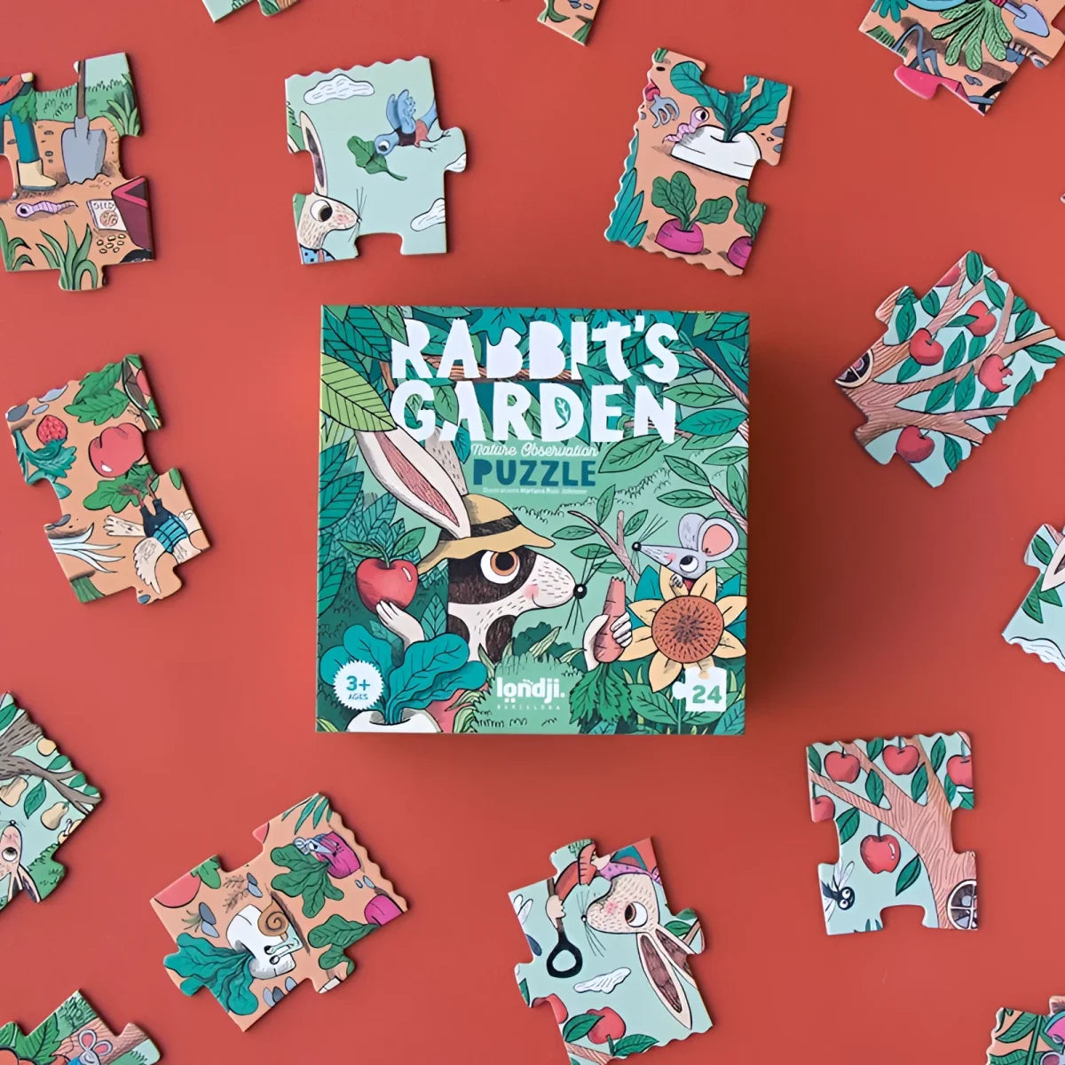 Puzzlebox von Rabbit’s Garden umgeben von bunten Puzzlestücken
