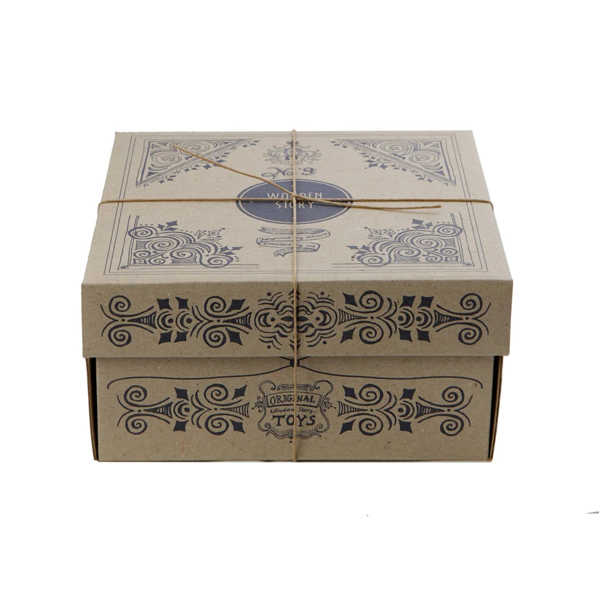 Rustikale beige kartonbox mit schwarzen ornamenten und blauer houtenstory etikett für nachhaltige babykleidung schweiz