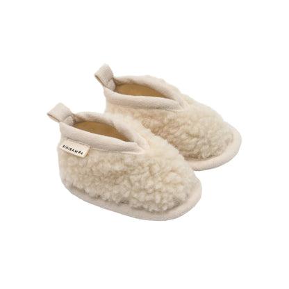 Fluffige, cremefarbige Babybooties aus Schaffell, Modell Milk