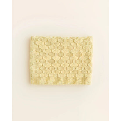 Pale yellow textured fabric swatch for Schal Gigi in Light Yellow