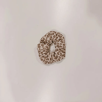 Leopard print Scrunchie from the Scrunchie Collection for fashionable hairstyles