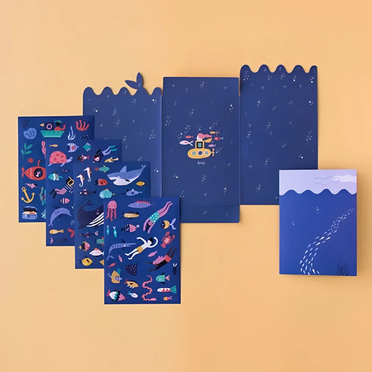 Dekorative blaue Notizbücher mit ozeanbezogenen Illustrationen für Sea Stickers