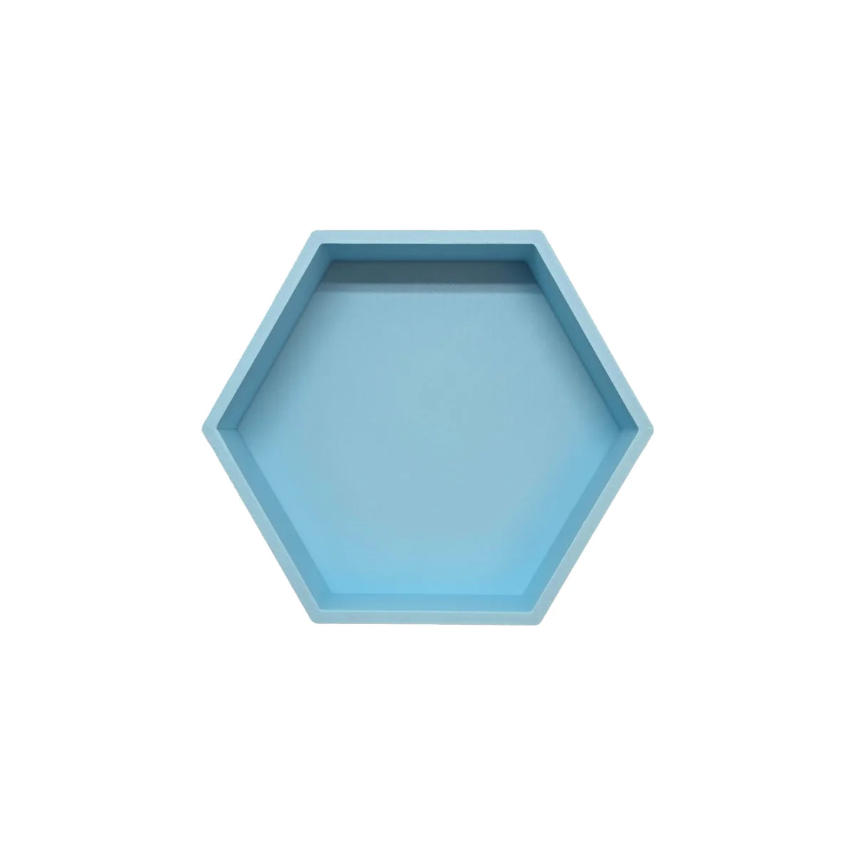 Ein hellblaues hexagonales spielschälchen mit matter oberfläche ideal für ökologische baby- und kinderprodukte