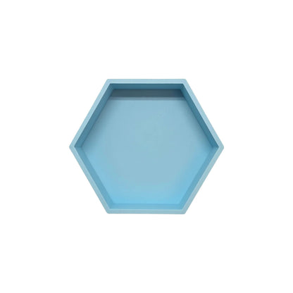 Ein hellblaues hexagonales spielschälchen mit matter oberfläche ideal für ökologische baby- und kinderprodukte