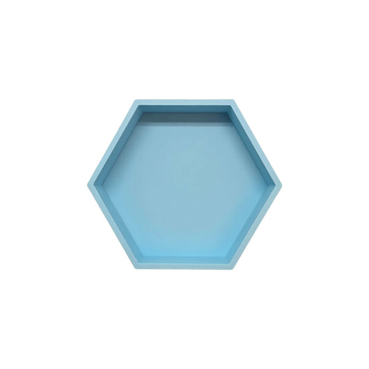 Ein hellblaues hexagonales spielschälchen mit matter oberfläche ideal für ökologische baby- und kinderprodukte