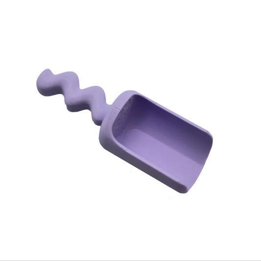 Pastellviolettes Spielschäufelchen Wave mit welligem Griff, ideal für kreative Bastelarbeiten